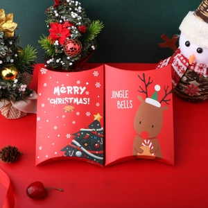 Red Christmas pillow gift boxes with snowman and mini tree decorations for holiday favors