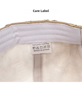 Macro detail of the care label and polyester lining inside the striped baseball cap