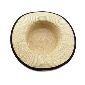 Classic beige woven straw sun hat with black ribbon edge trim for summer outdoor beach use