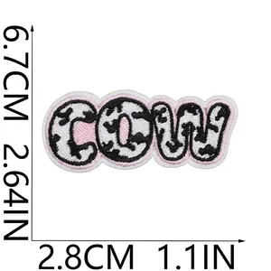 Detailed dimensions of the cow print embroidered patch measuring 6.7cm by 2.8cm