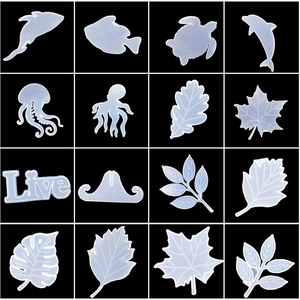 Detailed grid view of diverse silicone molds for nautical and leaf shaped cake decorations