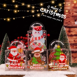 Transparent PVC Christmas gift box with Santa and reindeer patterns and handle detail