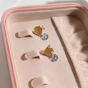 Golden fish shaped earrings with crystal drop charms in a pink velvet jewelry box