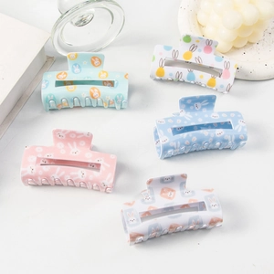 Easter hair claw clip set with colorful bunny and egg prints in soft pastel tones
