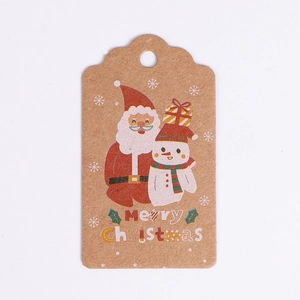Close-up of Kraft paper Christmas gift tags with Santa, snowman and Merry Christmas text