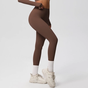 Detailed side view of high-waisted dark brown yoga pants with brushed texture for women