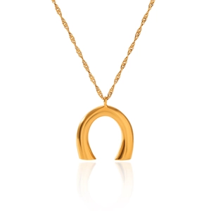 Detailed view of golden U-shaped horseshoe pendant on a delicate water wave chain