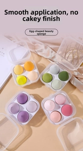 Detail of a 4-piece makeup sponge set in transparent storage cases with varied shapes