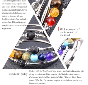 Detailed view of bohemian multi-layer wrap bracelet featuring lava stones and silver beads