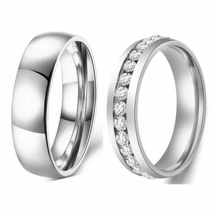 Set of 316L stainless steel rings featuring a plain band and a cubic zirconia channel ring