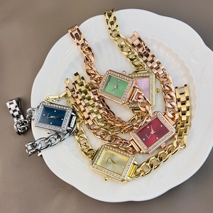 Detailed arrangement of square quartz watches with rhinestone bezels and metal chains