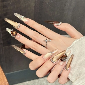 Brown gradient press-on nails with luxury amber gemstones and sparkling diamond accents