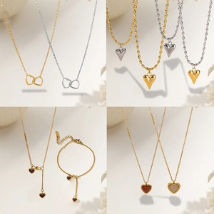 Fashionable titanium steel necklace and bracelet set with double heart pendants in gold and silver