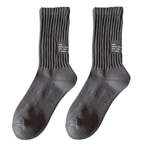 Thick dark grey cotton mid-calf socks with white lettering print and ribbed knit texture