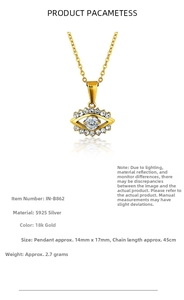 Detail of S925 silver 18K gold evil eye pendant with sparkling cubic zirconia stones