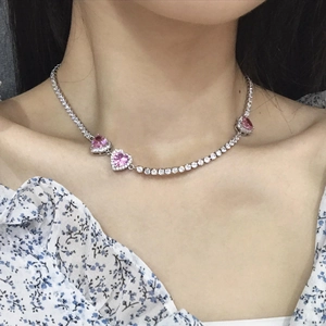 Pink heart pendant choker necklace with sparkling zircons on a silver tennis chain