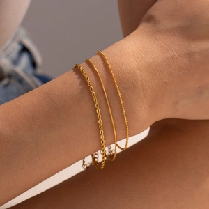 Chic 18K gold-plated titanium steel chain bracelet set featuring twisted and snake links