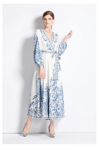 Detail of V-neck wrap dress with blue floral porcelain print and waist tie closure