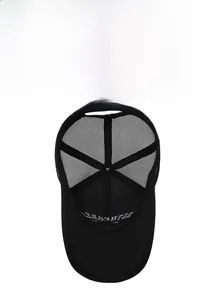 Detail shot of black breathable mesh structure and fabric brim of the baseball cap