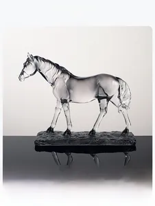 Detailed view of horse resin statue with semi-transparent texture and black rock base