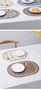 Detail of oval leather table mat with chain pattern in elegant dining setting