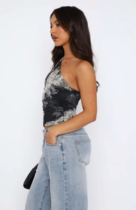 Detail of grey snakeskin print one-shoulder top with side ruching texture
