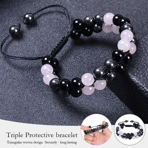 Triple protective bracelet with rose quartz and obsidian beads on black braided rope