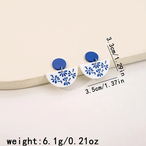 Detail view of blue floral acrylic earrings with size and weight measurement indicators