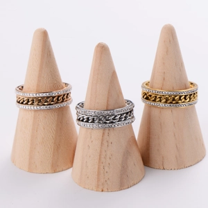 Classic braided knot rings with crystals in gold, silver, and rose gold finishes