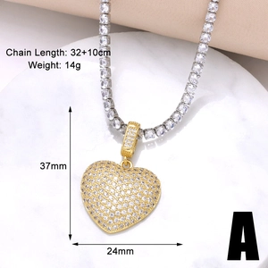 Macro shot of gold-plated heart pendant with zircons and 37x24mm size details