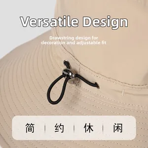 Detail of adjustable elastic drawstring with metal buckle on outdoor sun hat
