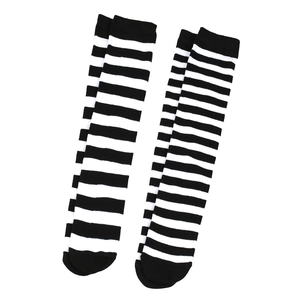 Detailed flat lay view of classic black and white striped over-the-knee socks on white background