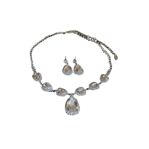 Elegant silver teardrop crystal necklace and earring set with shimmering rhinestones