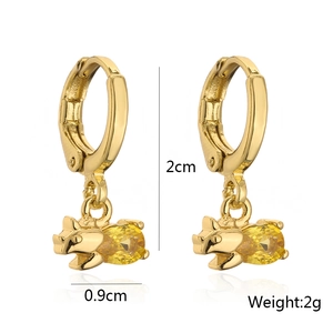 Detail of 18K gold-plated pig earrings with yellow zircon, size 2cm, weight 2g