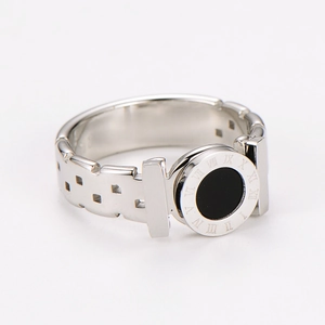Detail shot of silver stainless steel ring with black enamel and Roman numerals engraving