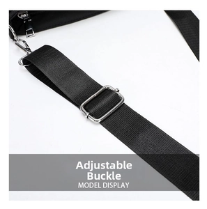 Detail of adjustable nylon shoulder strap with silver metal buckle and hook