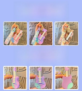 Detailed view of colorful guitar silicone keychains with Rock and Roll slogan wristlets