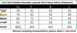 Detailed size chart for the mini dress featuring shoulder pads and layered decoration
