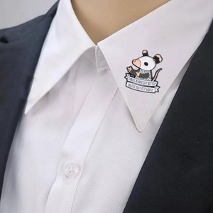 Cartoon opossum enamel pin on shirt collar with funny English slogan text banner