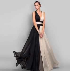 Detail of elegant black and beige color-block V-neck sleeveless chiffon maxi dress