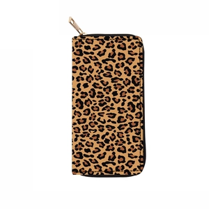 Close-up of long zip-around wallet featuring classic brown leopard print and gold hardware
