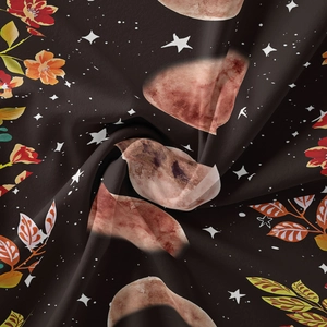 Detailed close-up of bohemian moon phase tapestry fabric with floral prints