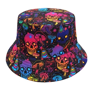 Detail of neon skull and mushroom pattern on a black street-style reversible bucket hat