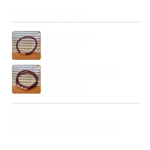 Size and weight specifications for garnet and strawberry quartz multi-layer beaded bracelets