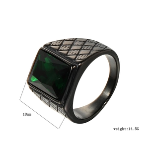 Macro detail of men's vintage black ring featuring square green stone and 18mm height