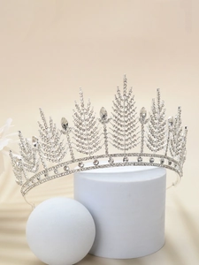 Detailed view of alloy bridal crown featuring leaf design and shimmering crystals