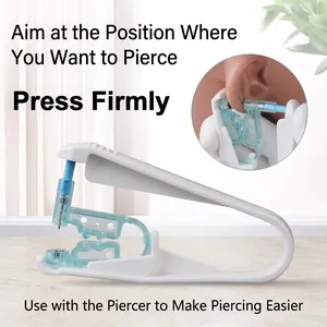 Disposable ear piercing gun with surgical steel needle and white plastic support tool