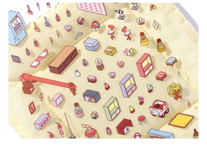 Detail of PET stickers showing cute miniature cartoon furniture and scenery patterns