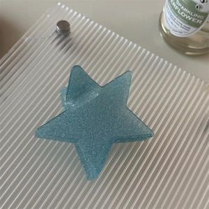 Blue glitter star hair claw clip made of translucent resin for women hairstyle