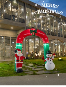 Outdoor inflatable Christmas arch with Santa and Snowman in red and green festive colors